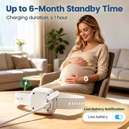 A pregnant woman sits in a living room while wearing a smartwatch, with a white wearable battery backup device shown on a table in the foreground. Text highlights up to 6-month standby time, charging duration of less than 1 hour, low battery notification, and a low battery toggle.